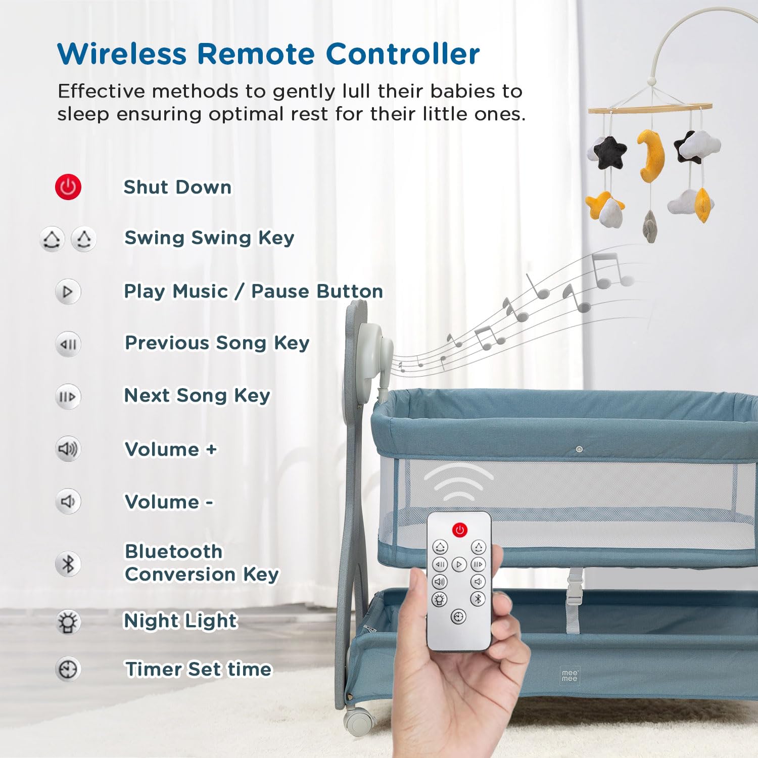 Wireless remote controller for a baby crib with musical and lighting features, held by a hand.